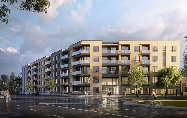 Vue extérieure du complexe Exal NDG, avec des balcons spacieux et des espaces verts bien aménagés. L'architecture contemporaine s'intègre harmonieusement dans son environnement urbain, offrant un cadre de vie agréable et durable.